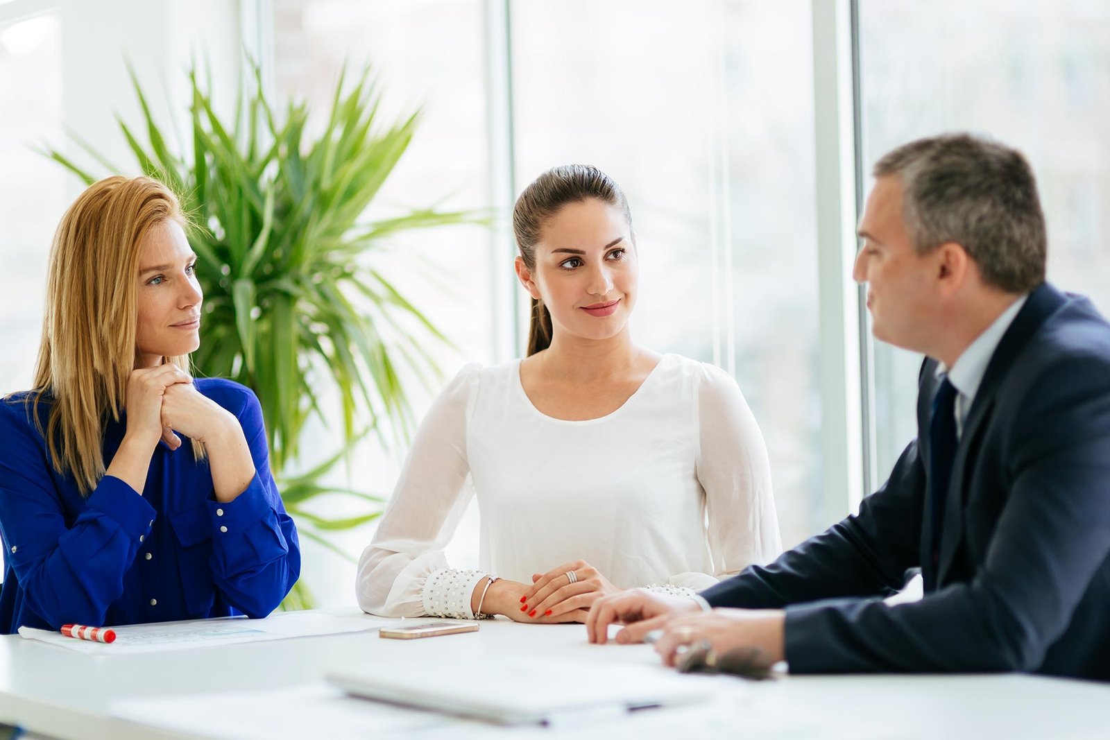 Contact Us 1 business people discussing future plans 2021 04 05 15 32 07 utc